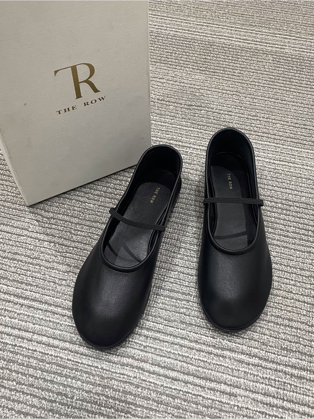 The Row Black Leather Mary Jane Flats